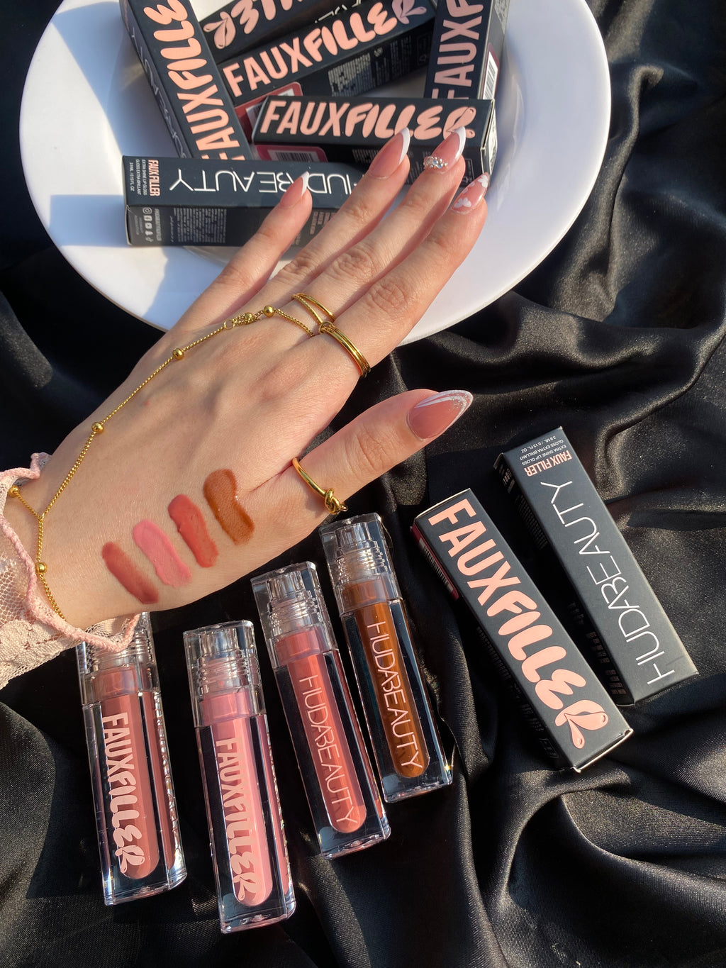 Huda beauty fauxfiller extra shine gloss 🎀